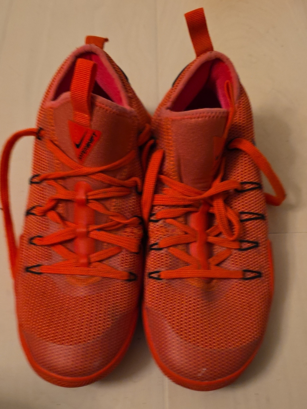 Nike Women’s Bright Orange Athletic Sneakers with Pink Lining